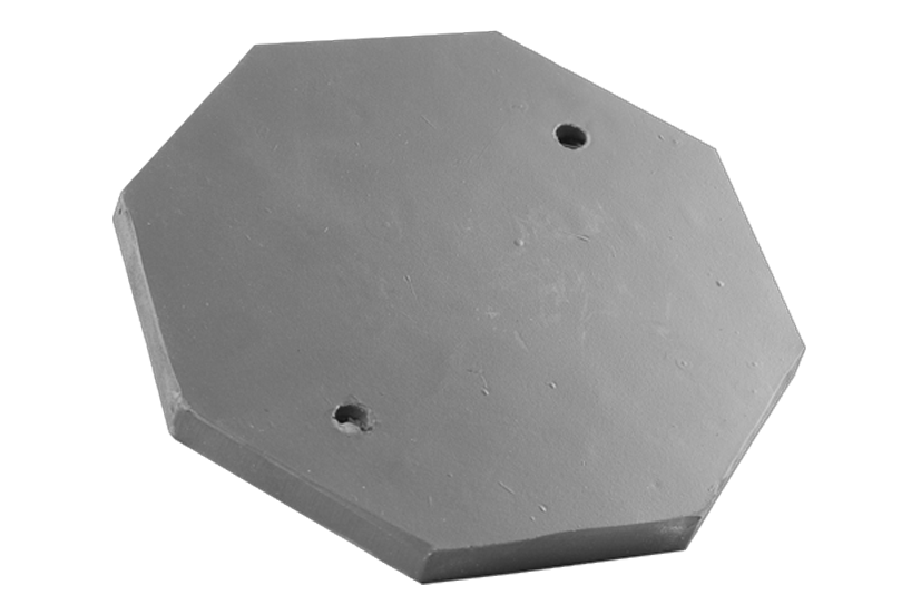 Rückansicht eines schwarzen, achteckigen Gummitellers (Artikelnummer GTCN001) für KFZ-Hebebühnen, mit zwei Löchern zum Verschrauben am Tragteller.